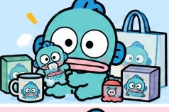 Hangyodon sitting happily surrounded by his own merchandise collection